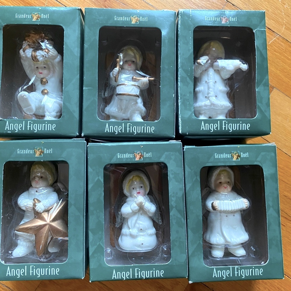 Collectible porcelain Angel figurines six piece Retired set.